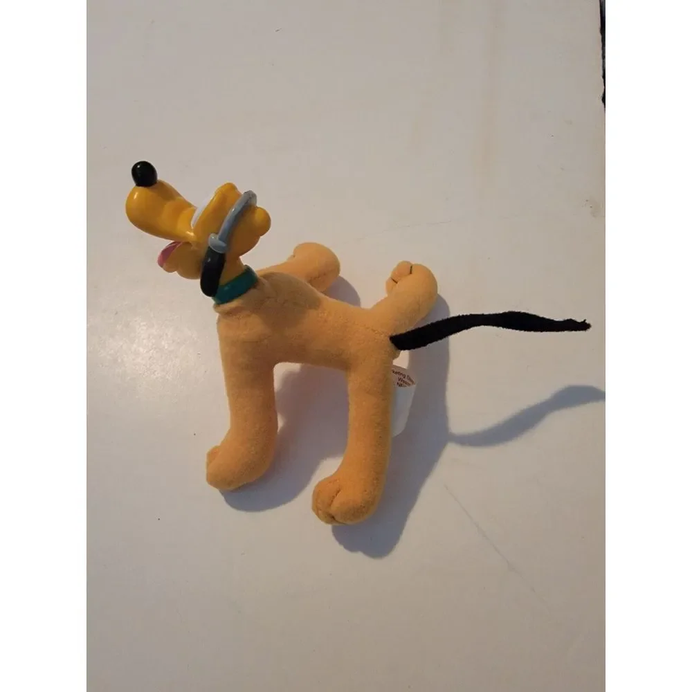 DISNEY'S Pluto 4